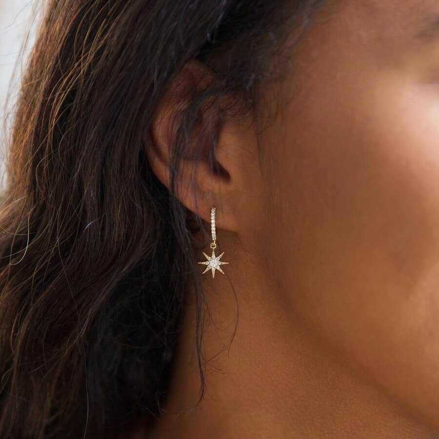 Crystal star huggie hoop earrings in gold