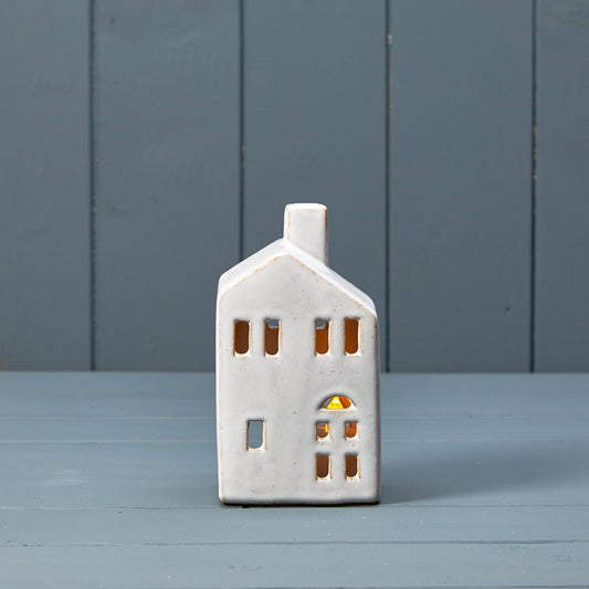 Ceramic house tealight with reactive glaze