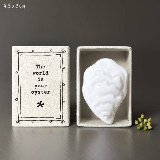 Porcelain Matchbox Token - The World Is Your Oyster