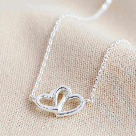 Tiny Interlocking Hearts Necklace in Silver